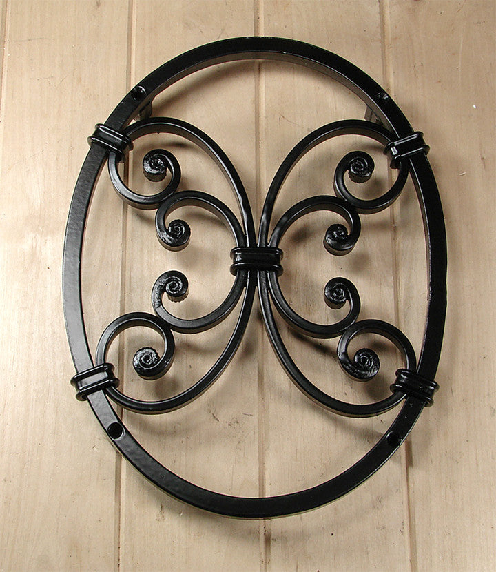 Oval door and gate grille featuring decorative scroll work, measuring 9-7/8" x 12-5/8", available in multiple finishes.