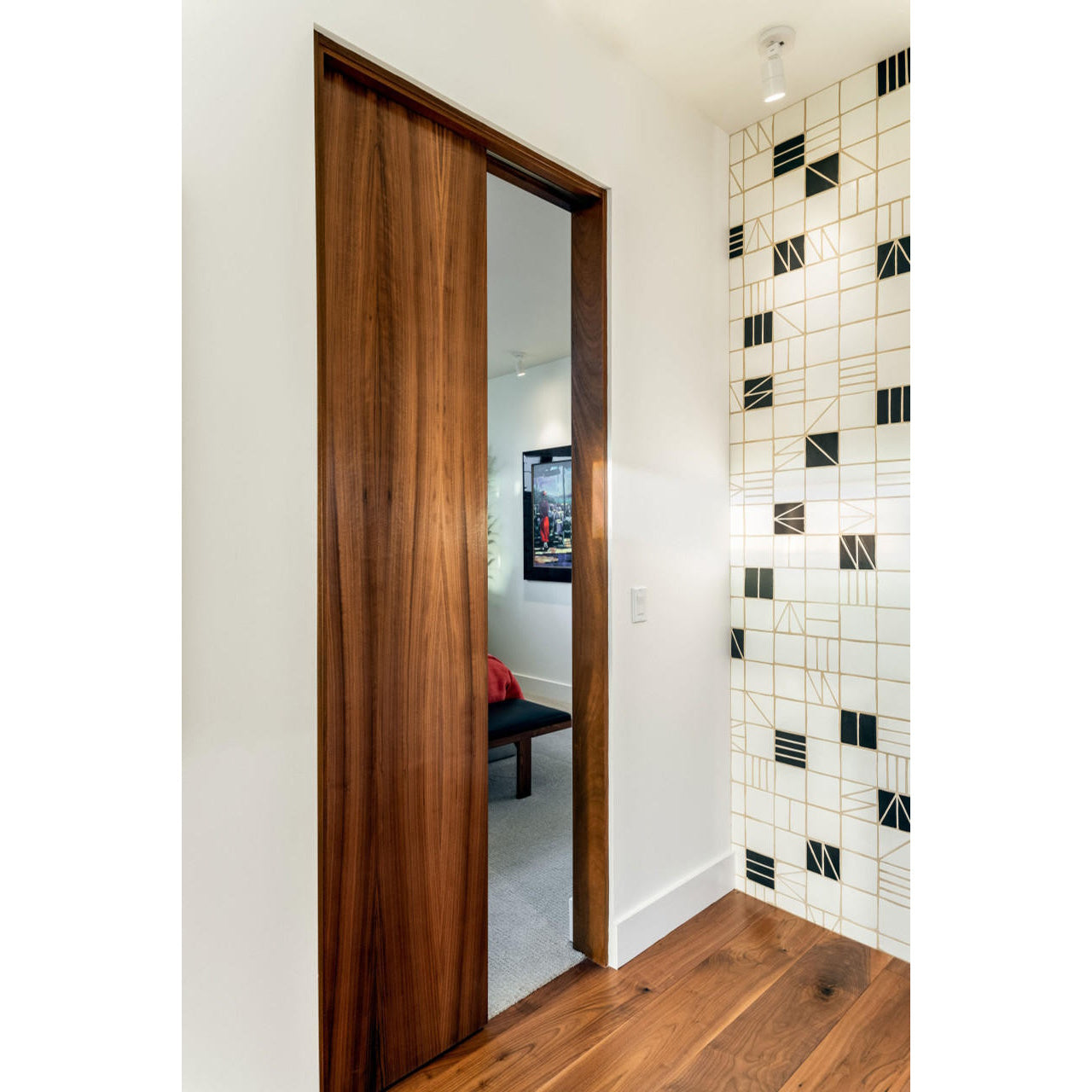 Sliding pocket door system with soft close feature, available in silver finish, suitable for surface or recessed mounting.