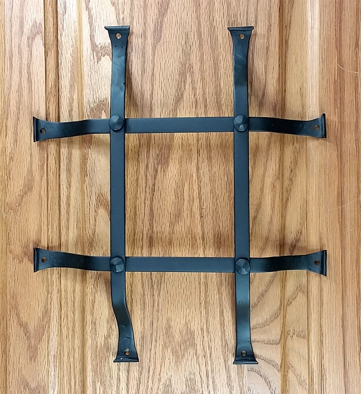Standard curled tip door and gate grille in black powder coat finish, 10x12 inches with flared mounting legs.