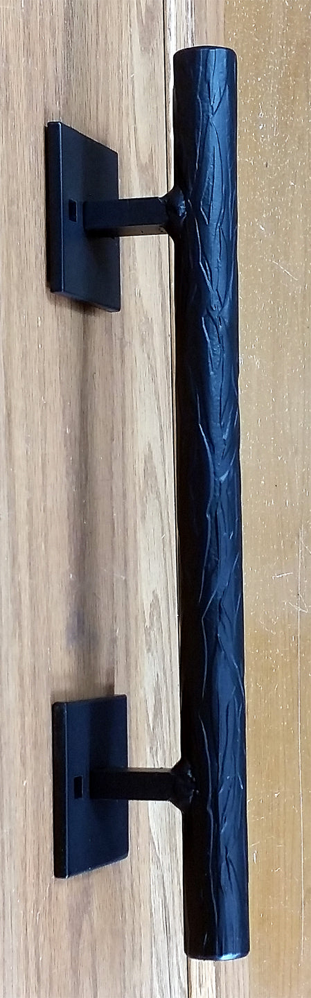 Tree branch door pull with a textured finish, 12 inches long, includes two mount plates, available in multiple finishes.