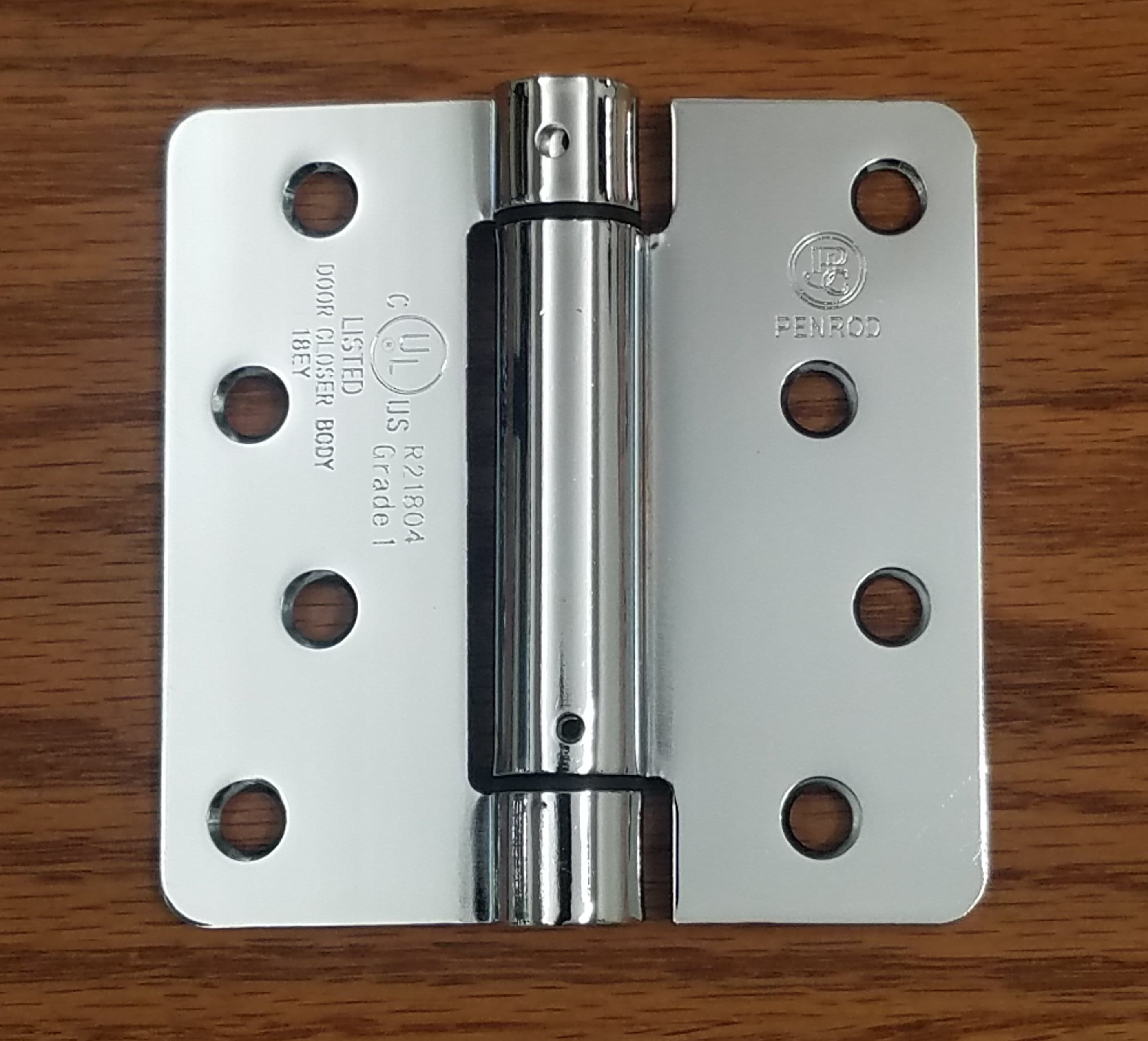 Polished chrome 4x4 spring hinges with 1/4-inch radius corners, ideal for doors and gates, sold in a 2-pack.