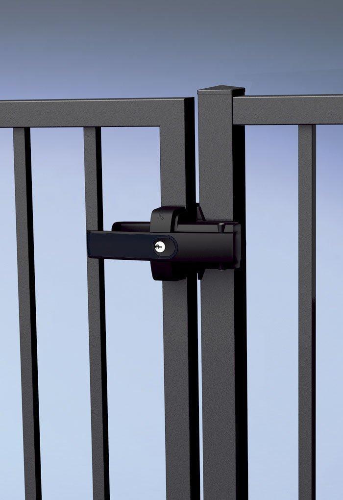 Magnetic lock latch in black mounted on a metal gate, providing secure closure and easy access.