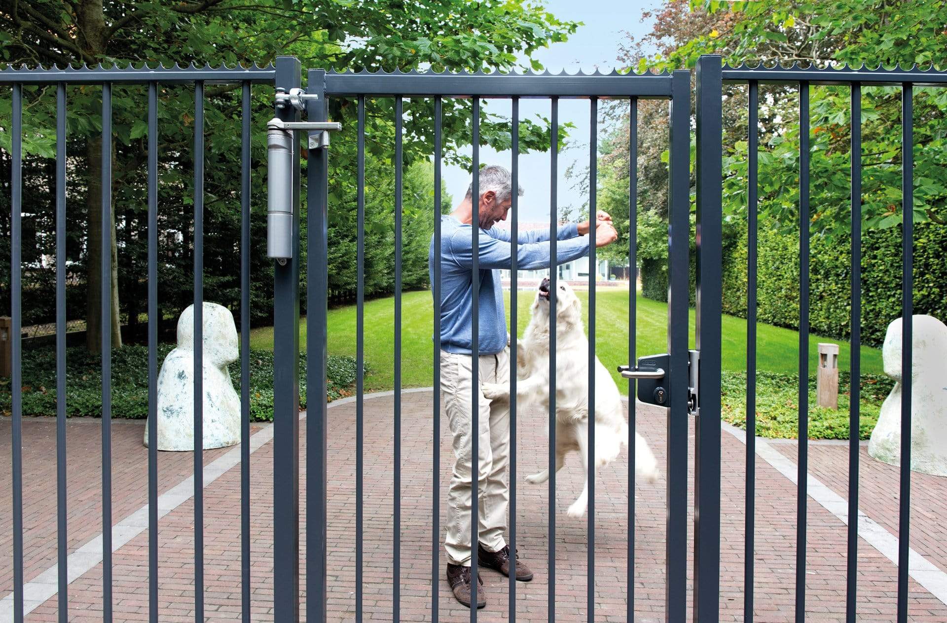 Adjustable stainless steel security keep for gates, compatible with square profiles 1-1/2" to 2-1/2", available in multiple finishes.