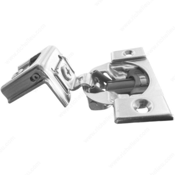 Compact Blumotion concealed cabinet hinge with 1-inch overlay and 110-degree opening, sold individually for smooth operation.