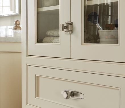 Highland Ridge Series cabinet latches in various finishes, 1-7/8 inch, designed for secure cabinet closure.