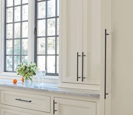 Sleek 3-inch center-to-center cabinet pulls in various finishes, enhancing modern kitchen cabinetry.