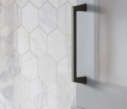 Blackrock series cabinet pull in black finish, 6-5/16 inch center to center, enhancing modern kitchen decor.