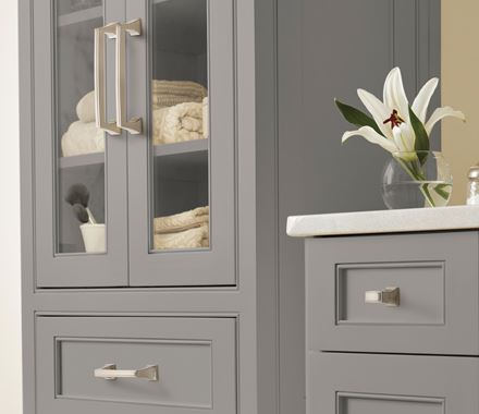 Satin nickel cabinet pulls from the Mulholland series, 5-1/16" center to center, enhancing modern kitchen design.