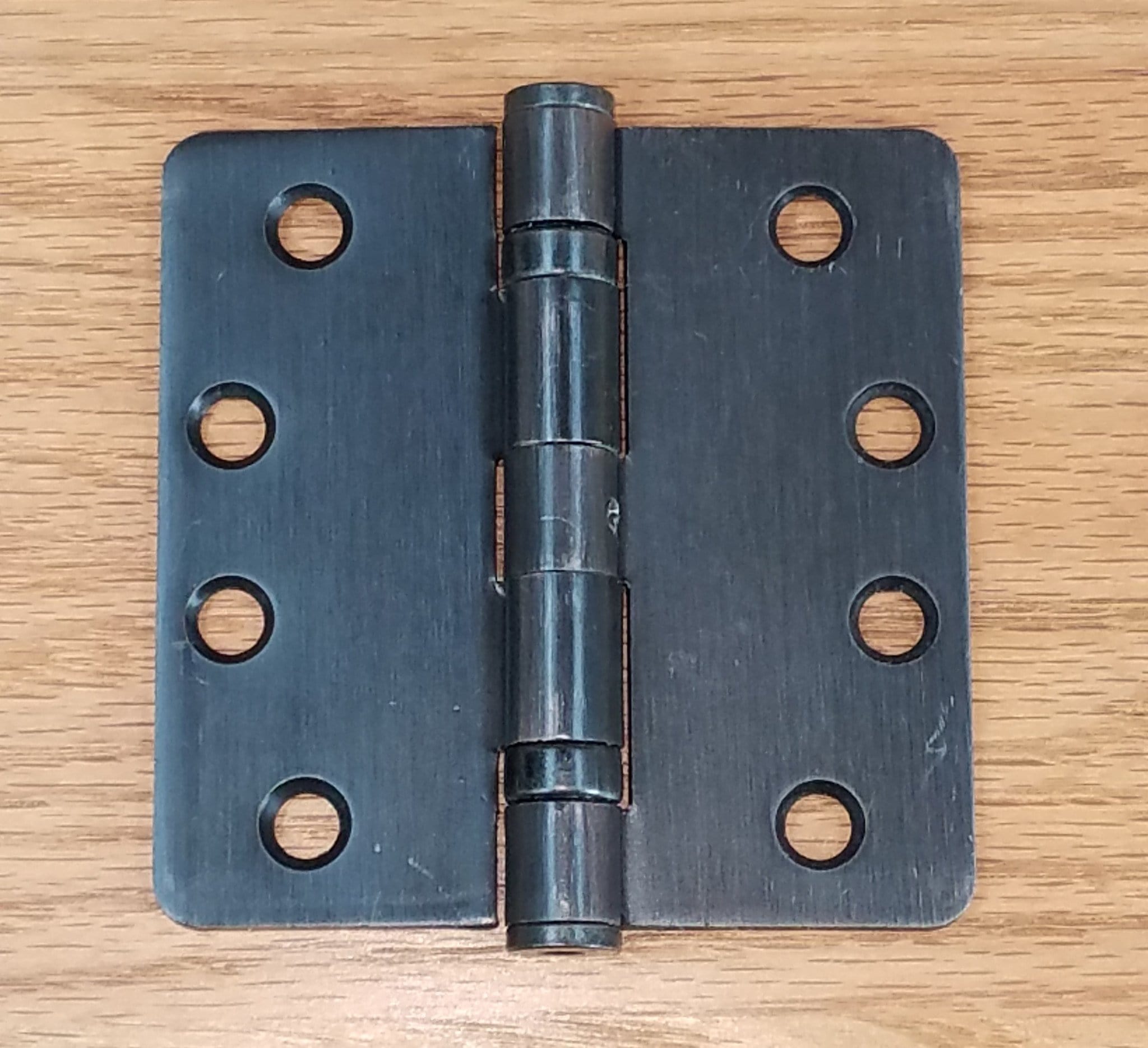 Commercial ball bearing hinge in oil rubbed bronze finish, 4 inches with 1/4 inch radius, sold in a 2 pack.