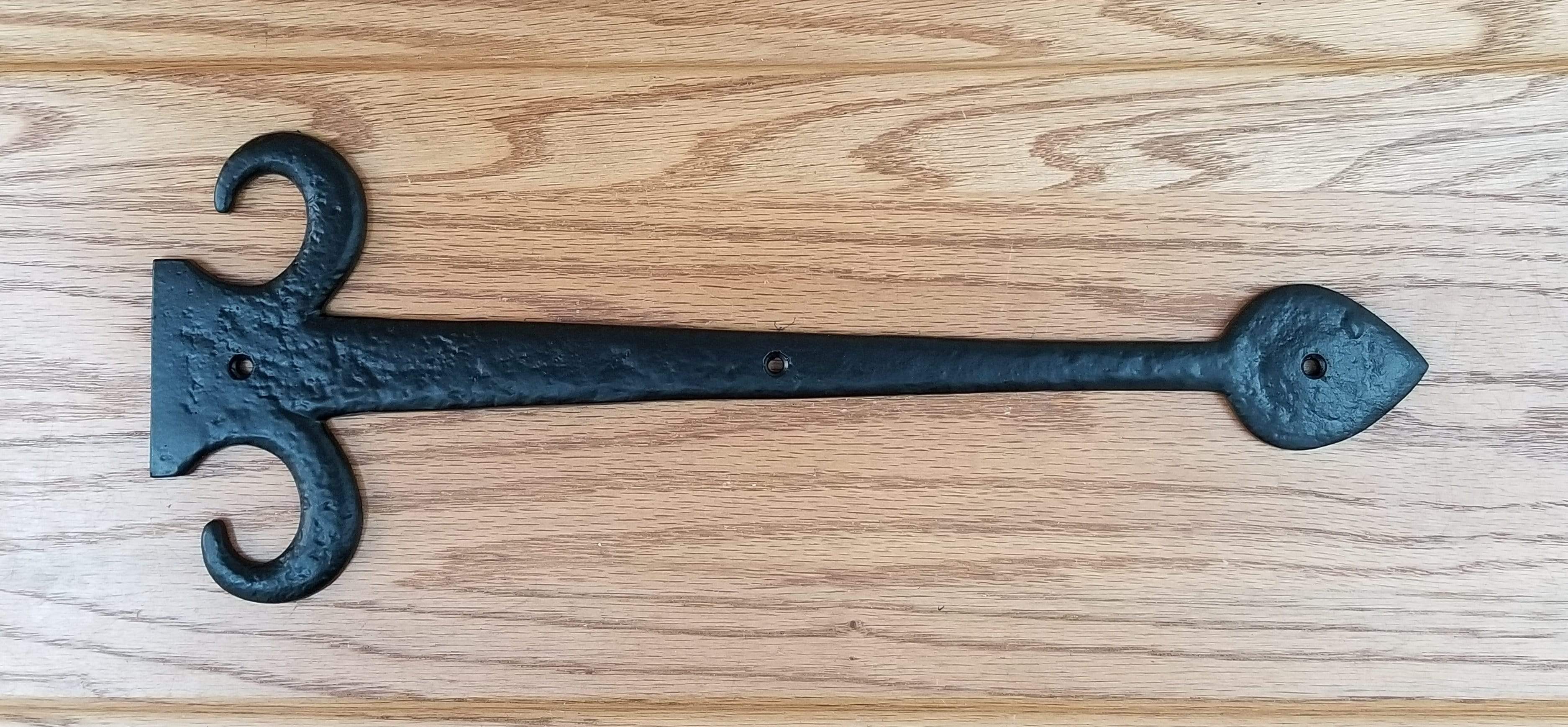 European black solid iron dummy strap hinge, 15 inches long, featuring a decorative design for doors or gates.
