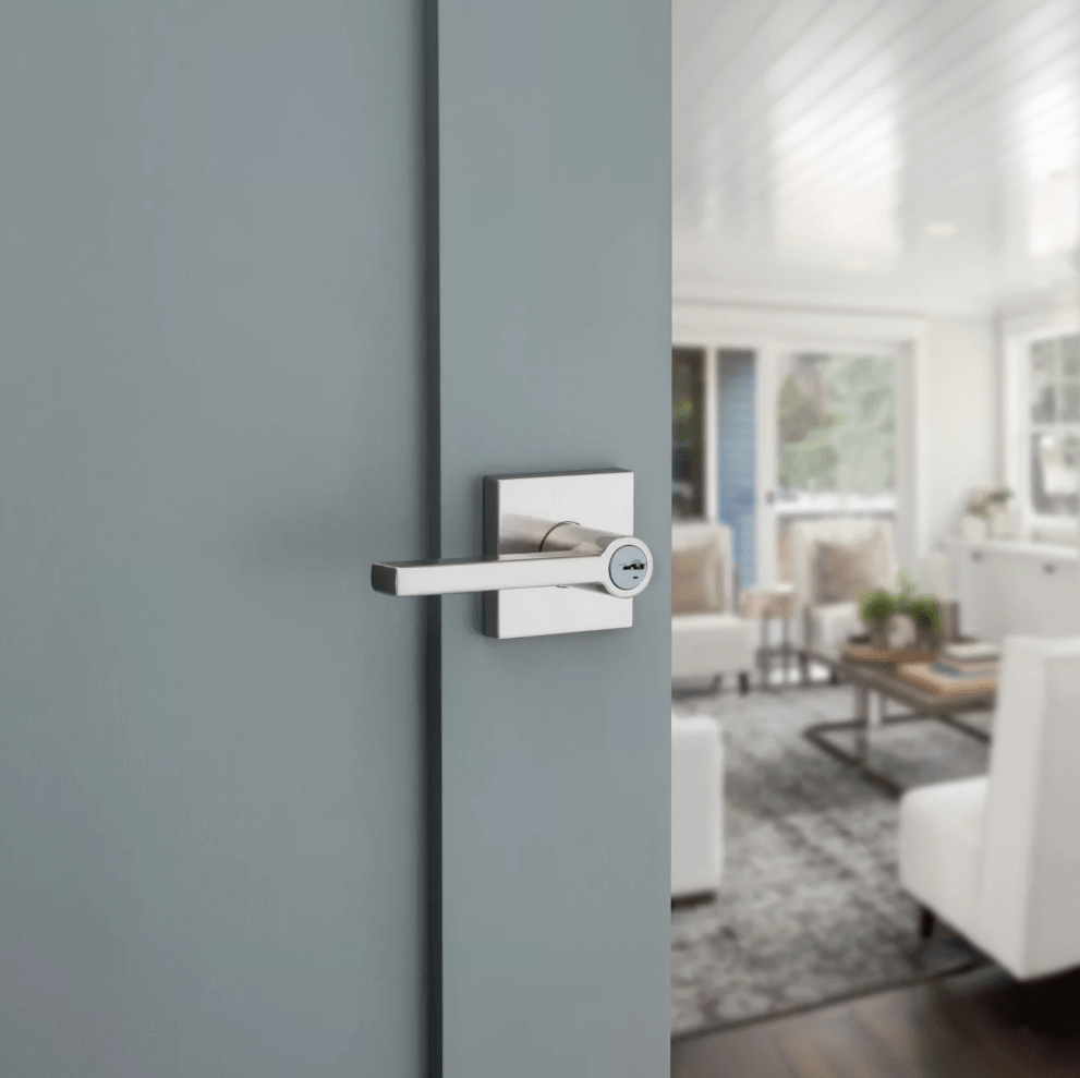 Satin nickel entry door lever lock with SmartKey security in Halifax square design, ideal for residential use.