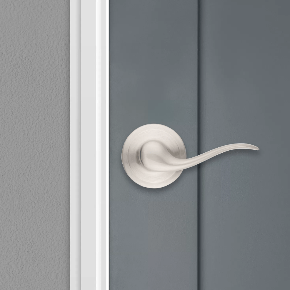 Satin nickel non-locking passage door lever in Tustin style with Microban antimicrobial protection for residential use.
