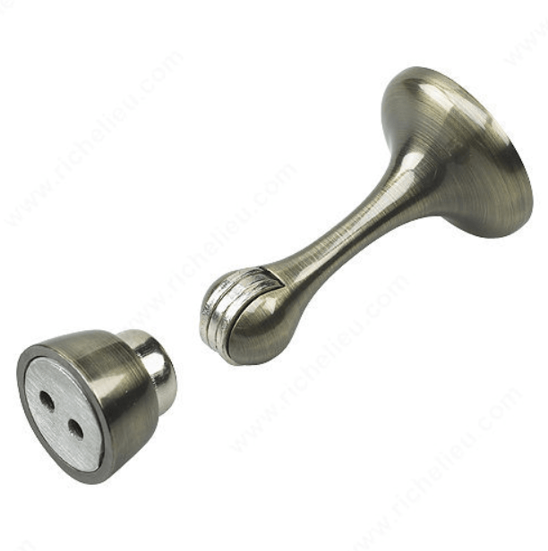 Magnetic door stop with a sleek design, 3 inches tall, available in multiple finishes, sold individually.