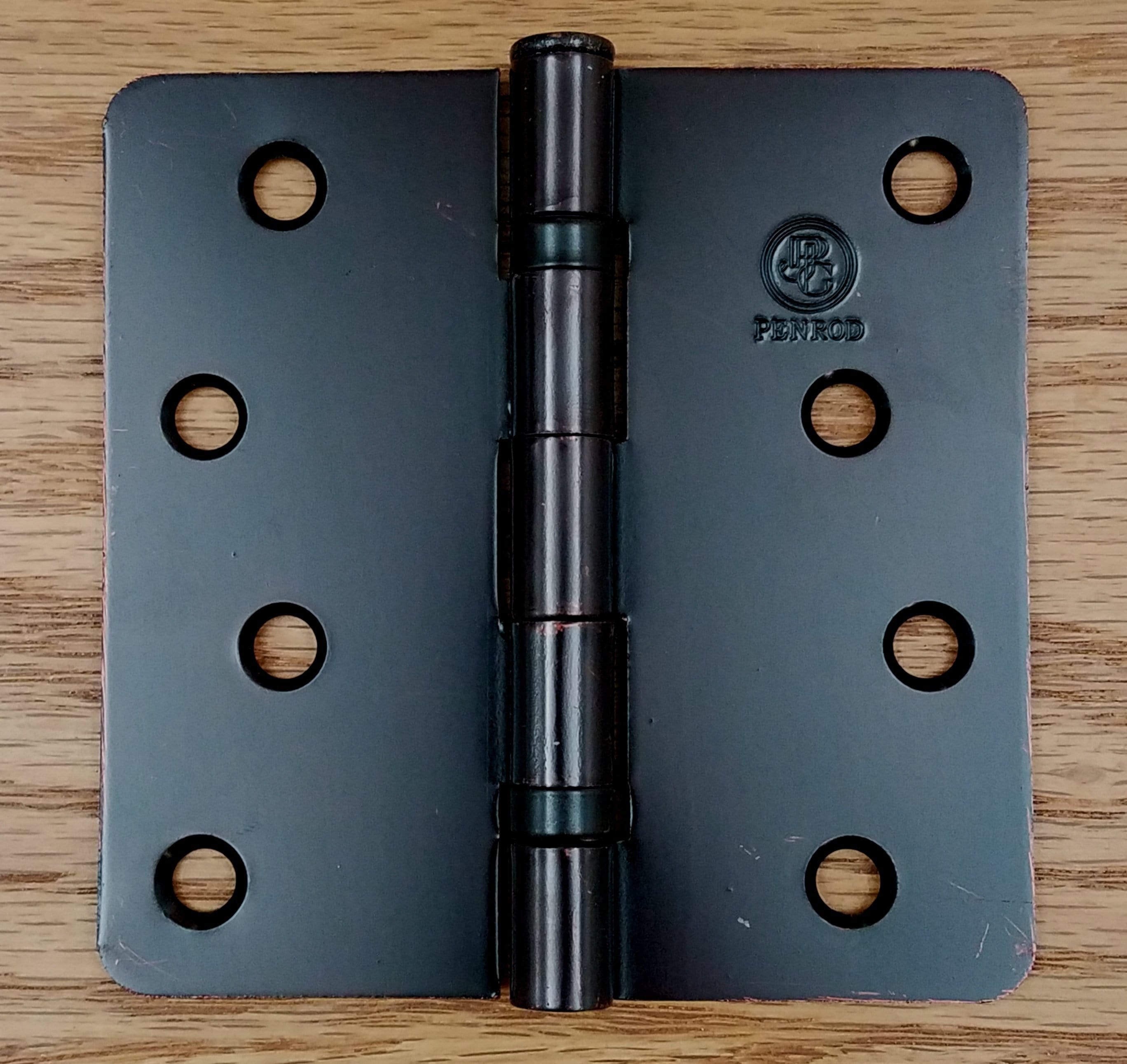 Residential Penrod ball bearing hinges in oil rubbed bronze, 4-inch size with 1/4-inch radius corners, sold in a 3 pack.