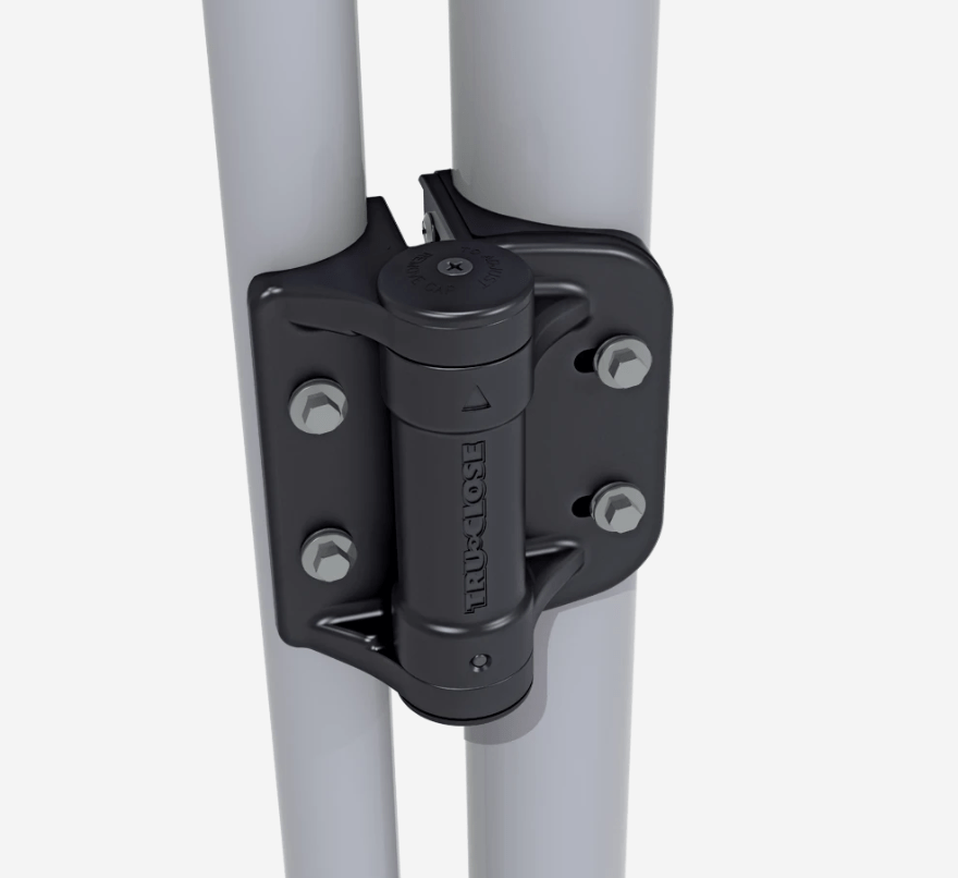 Adjustable black gate spring hinge for round posts, suitable for 5/8" to 1 3/8" gaps, ideal for chain link fences.