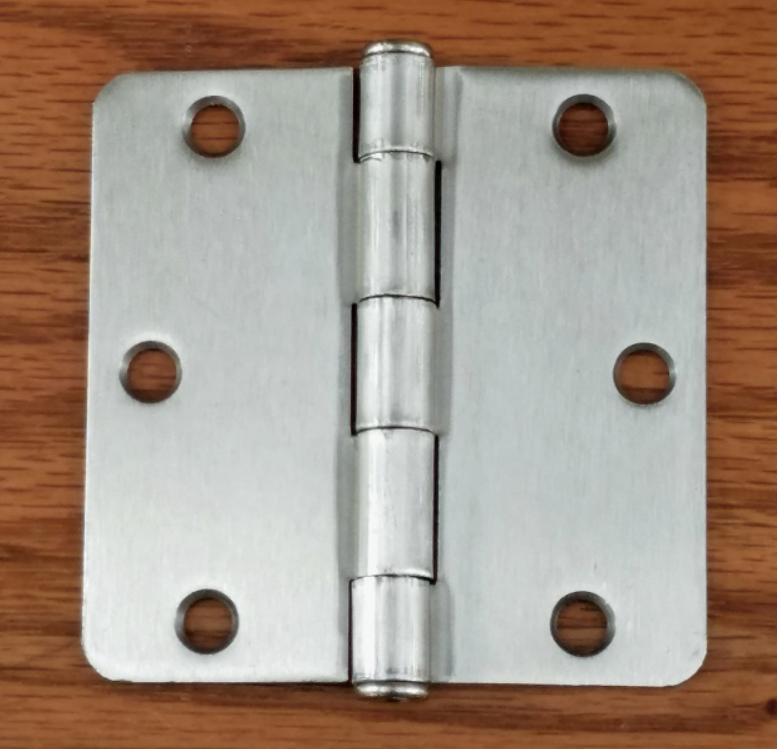 Plain bearing satin nickel butt hinges, 3.5 inches with 1/4 inch radius, sold in a 2 pack for residential doors.