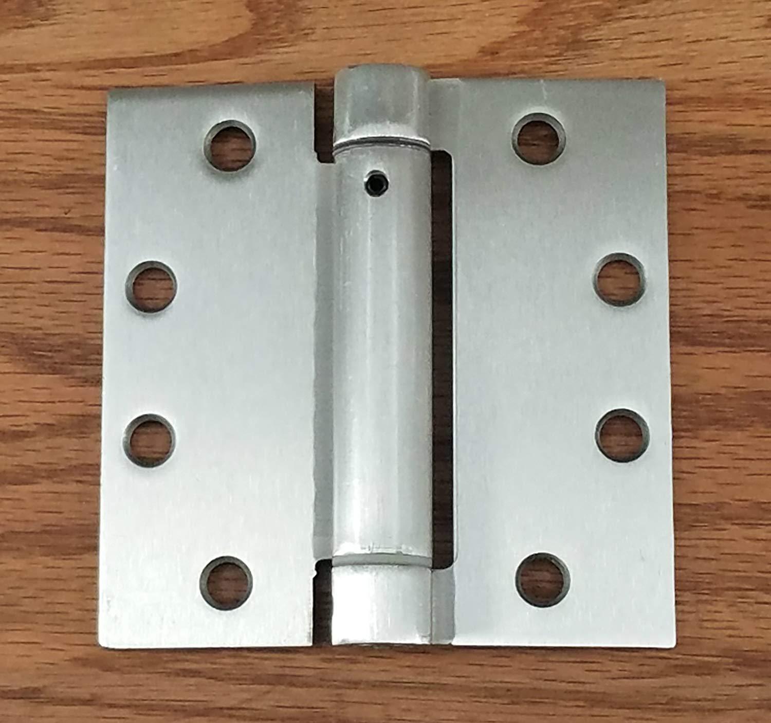 Satin nickel commercial spring hinge, 4.5x4.5 inches with square corners, sold in pairs for durable door applications.