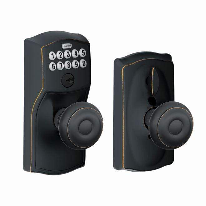 Schlage electronic keypad lockset featuring Georgian knob and Camelot trim in aged bronze finish, sold individually.