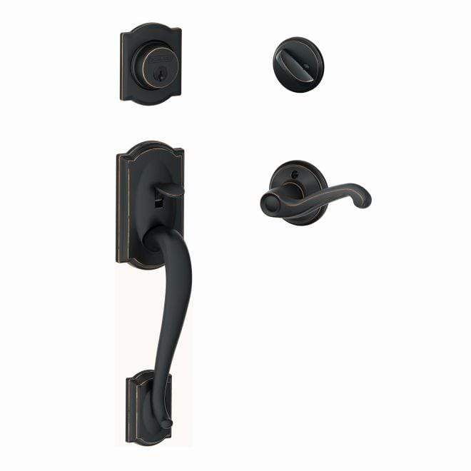 Schlage single cylinder handleset in aged bronze, featuring Camelot exterior and Flair interior design. Sold individually.
