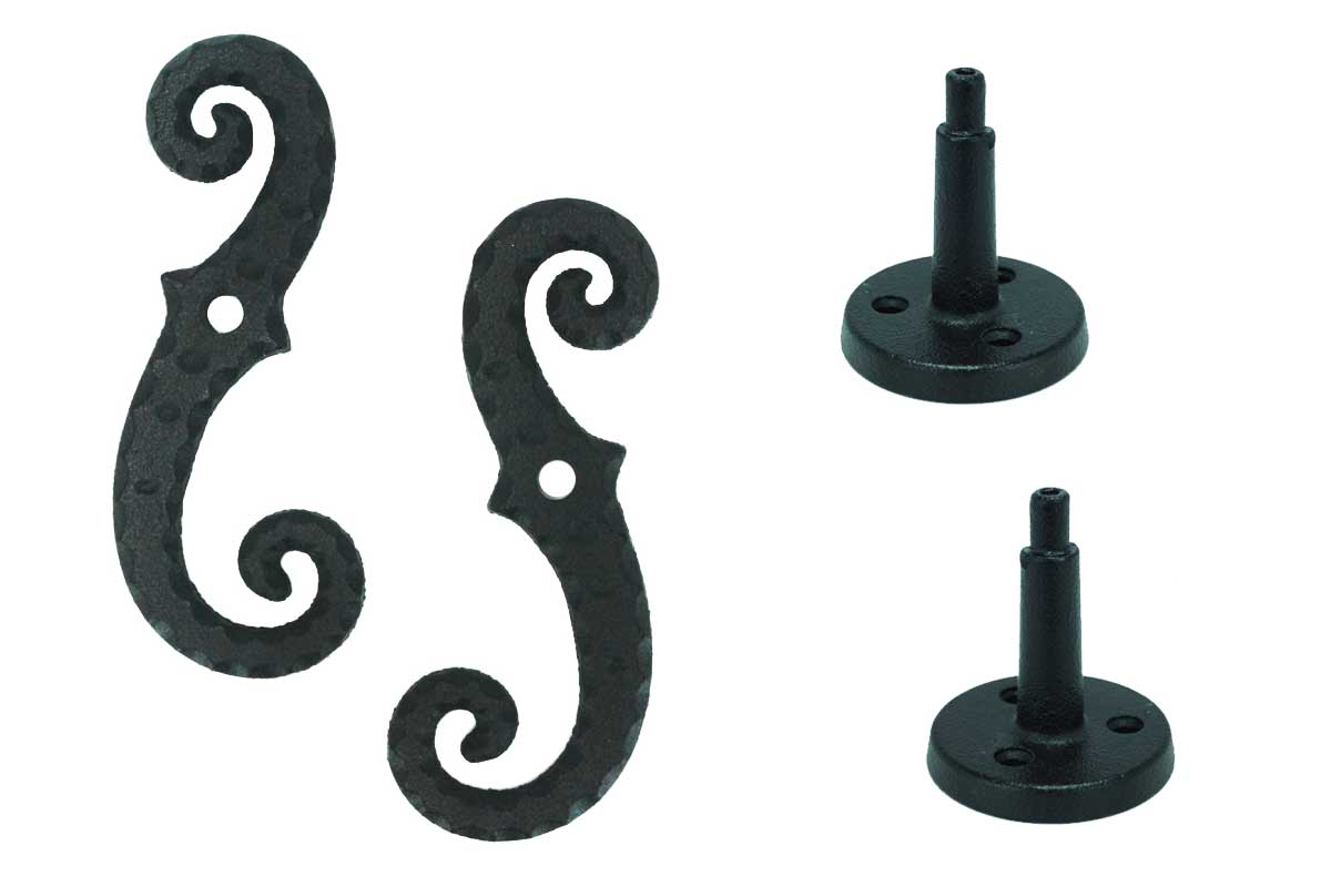 Black powder-coated cast iron shutter dogs and tiebacks in a scroll design, 6-3/4 inches, sold in pairs.