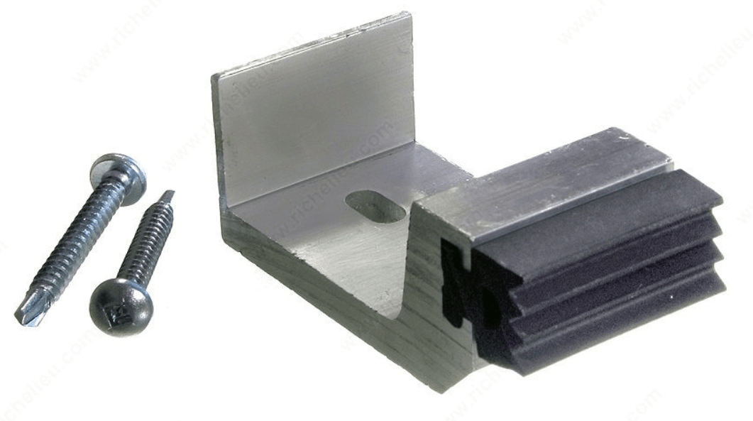 Heavy-duty sliding door stopper in satin aluminum, includes screws for easy installation and assists with door positioning.
