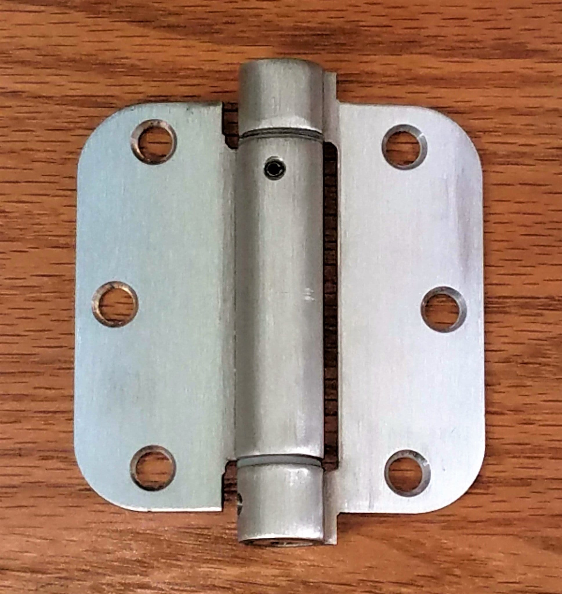 Stainless steel self-closing spring hinges, 3.5 inches with 5/8 inch radius corners, sold in a 2 pack for residential use.