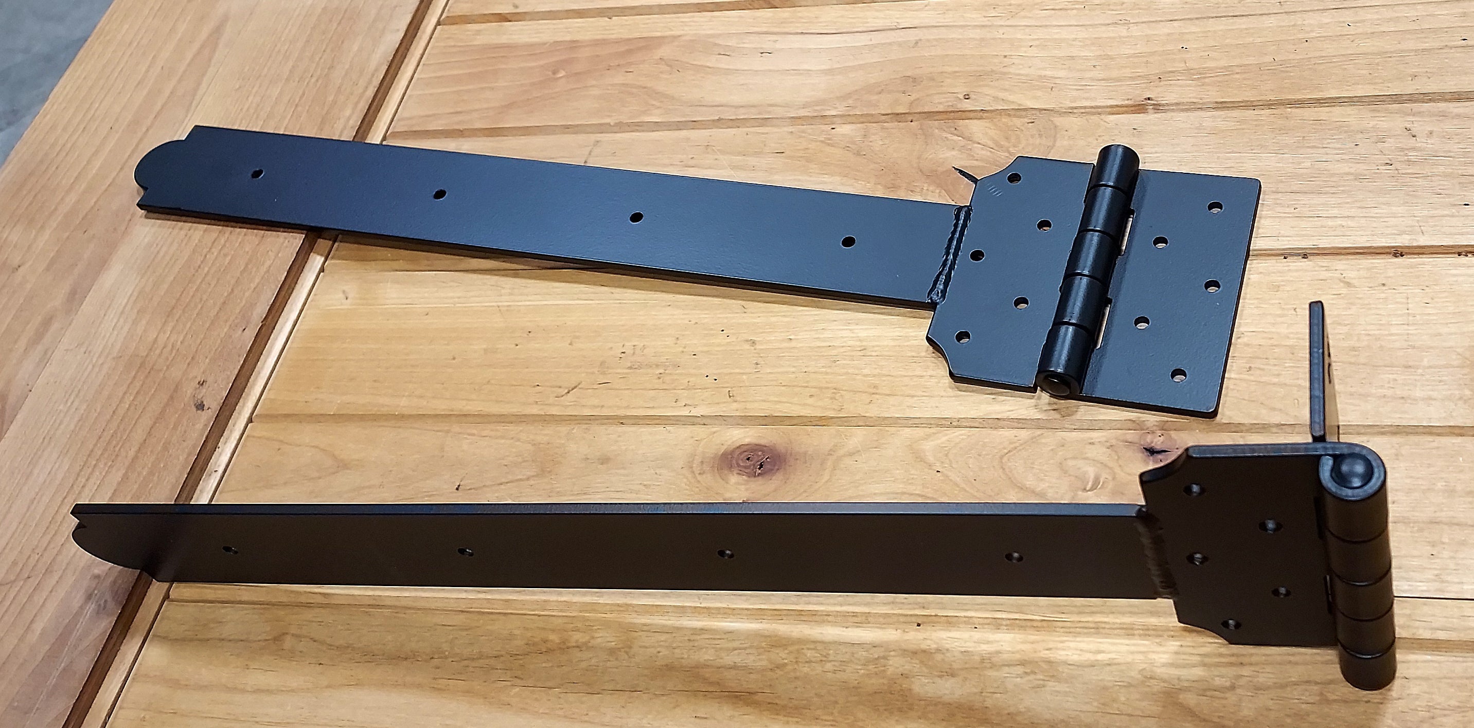 Super heavy-duty decorative strap T-hinge available in sizes from 14 inches to 26.5 inches for robust applications.