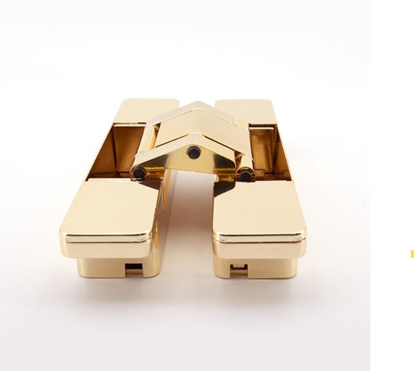Three-way adjustable concealed hinge for cladded doors, available in multiple finishes, sold individually.