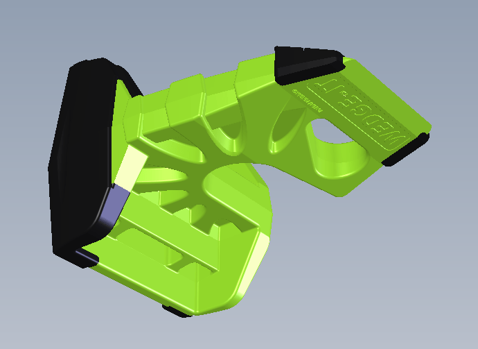 Portable Wedge-It doorstop in vibrant green with black accents, designed for temporary door security.