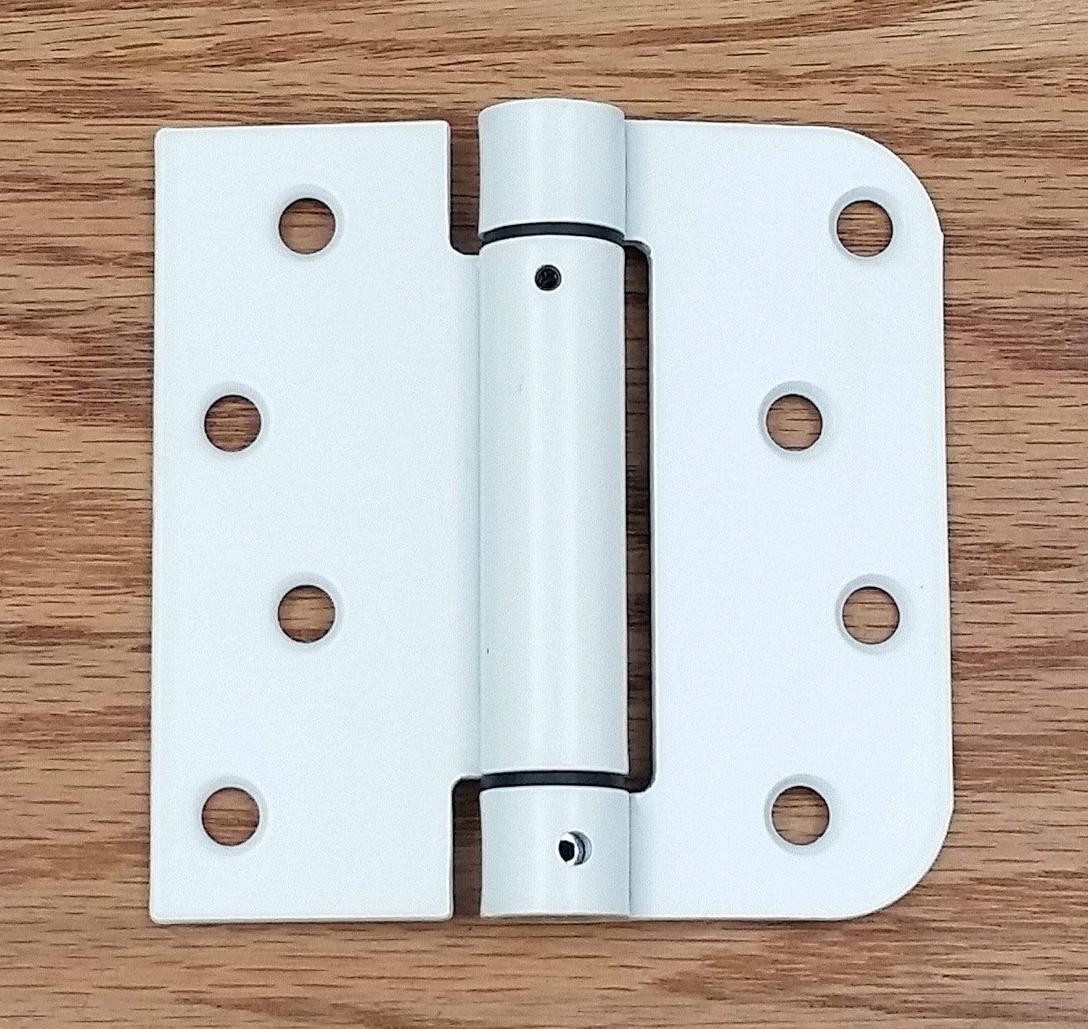 Self-closing 4-inch spring hinge with 5/8-inch square radius, available in multiple finishes, sold in a 2-pack.