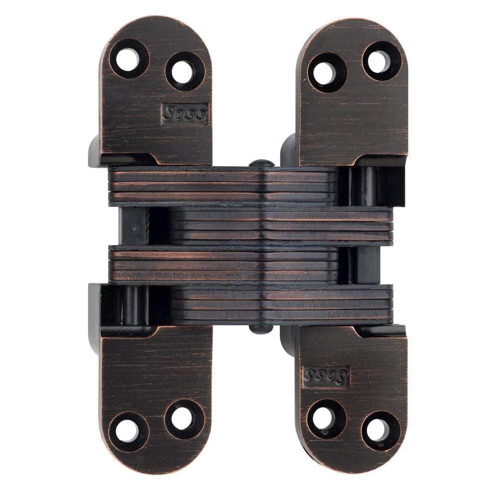 Concealed door hinge measuring 1-1/8 inch by 4-5/8 inch, suitable for 1 3/4 inch thick doors, available in multiple finishes.